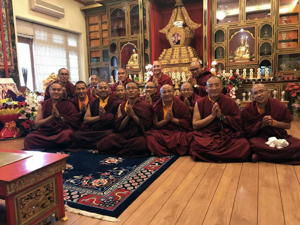 Newly appointed khenpos gather for prayers in the presence of the sacred Kudung of Kyabje Mindrolling Trichen